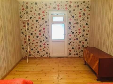 Una cama o camas en una habitación de Guesthouse Buba Mestia