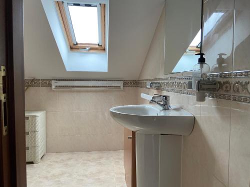 Kúpeľňa v ubytovaní Apartamentos Playa Langosteira