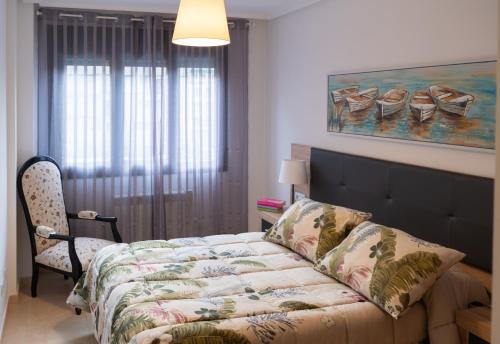 Postel nebo postele na pokoji v ubytování La Xalda, apartamento con piscina a 10 km de Llanes VUT-687-AS