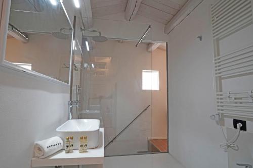 a bathroom with a shower and a sink at neropece in Ragusa