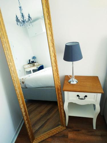 Postel nebo postele na pokoji v ubytování Colmar Suites - Résidence