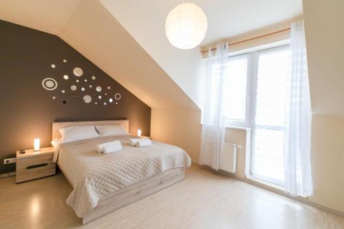 Posteľ alebo postele v izbe v ubytovaní Apartament Perłowy z balkonem- Dream Apart