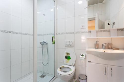 Ένα μπάνιο στο Apartman UZOR