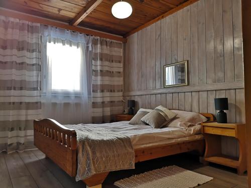 En eller flere senge i et værelse på Góralski dom niedaleko gondoli