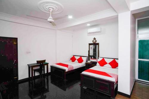 Katil atau katil-katil dalam bilik di Shirantha Hotel