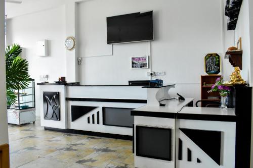 TV a/nebo společenská místnost v ubytování Mallika Resort