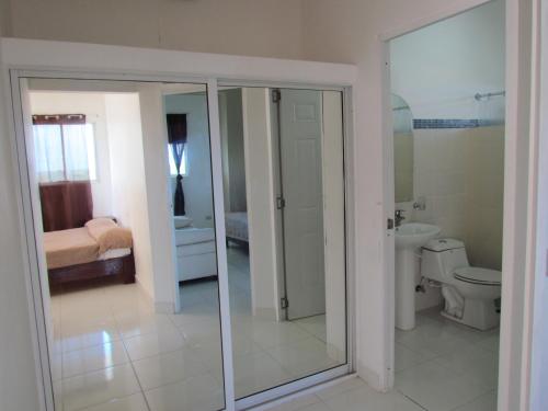 Ванная комната в Hotel Plaza Coral
