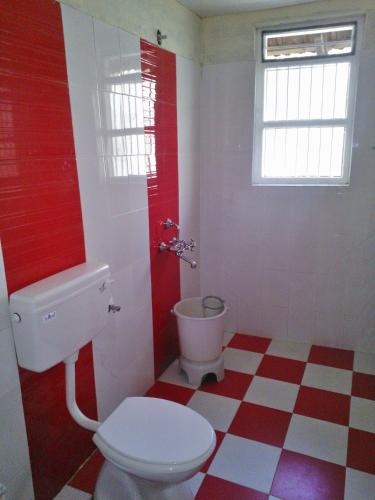 Un baño de Guddadamane Homestay