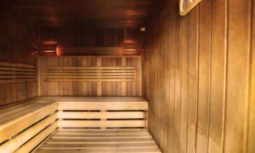 an empty sauna with wooden walls and ceilings at Stare Łazienki in Nałęczów