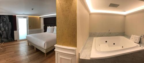Postel nebo postele na pokoji v ubytování Hôtel Merveilleux Côté Mer