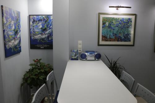 a room with a table with a camera on it at Laconian Collection "Lykourgou 10" in Sparti