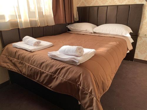 Un ou plusieurs lits dans un hébergement de l'établissement Guest house VRAZHDEBNA