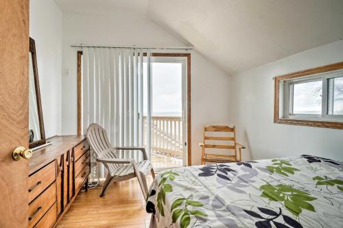 a bedroom with a bed and a dresser and a window at Waterfront Lake Erie Vacation Rental on the Strip! in Geneva-on-the-Lake