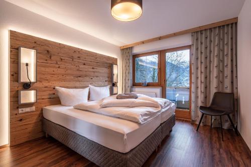 Postel nebo postele na pokoji v ubytování Landhaus Seiringer Apartments