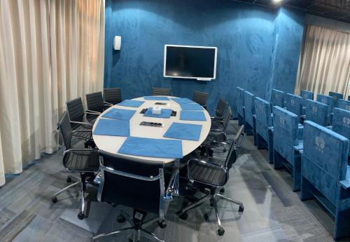The business area and/or conference room at Tiby Hotel