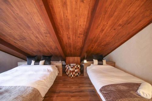 Ένα ή περισσότερα κρεβάτια σε δωμάτιο στο Apricot Pension