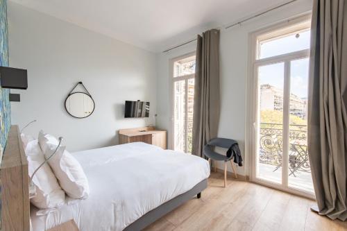 Postel nebo postele na pokoji v ubytování Hotel Aria