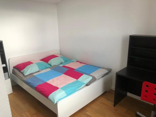 Ένα ή περισσότερα κρεβάτια σε δωμάτιο στο Ferienhaus Mainz