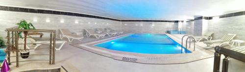 Πισίνα στο ή κοντά στο Grand Rimedya Hotel Bursa