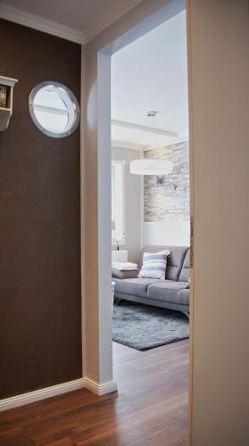 a view of a living room with a couch at Ferienwohnung Seestern in Neunkirchen