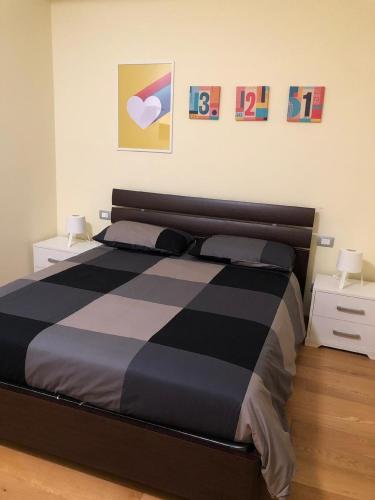 A bed or beds in a room at FORT. Montagna A305