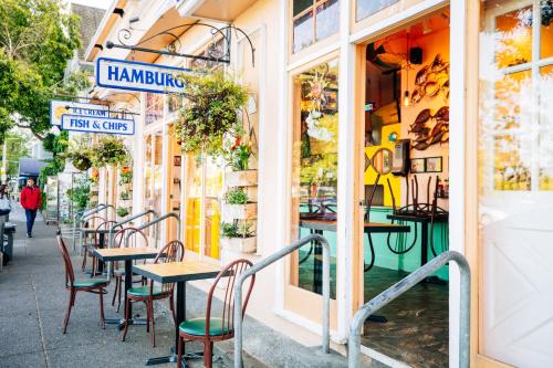 a row of tables and chairs outside of a restaurant at Cavallo Point in Sausalito