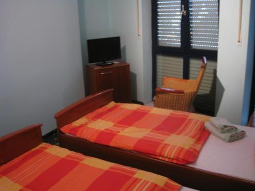 Postel nebo postele na pokoji v ubytování Hotel Restaurant "Waldschänke"