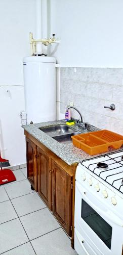 Virtuvė arba virtuvėlė apgyvendinimo įstaigoje Edificio Huayra