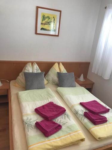 Ліжко або ліжка в номері Appartement Rettensteiner