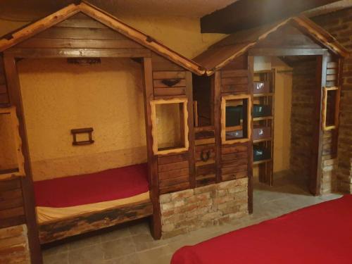 a room with two bunk beds in it at Apartma Miša in Prevalje