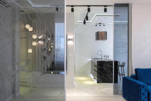 Galería fotográfica de White Tiger Apartment in Smart Plaza en Kiev