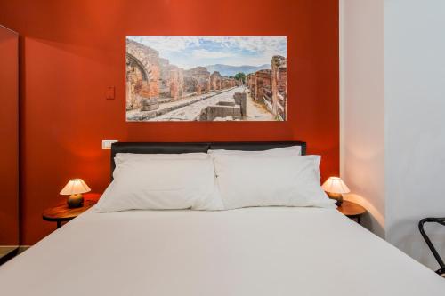 Pompei Centrum tesisinde bir odada yatak veya yataklar
