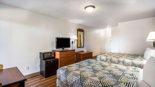 Postel nebo postele na pokoji v ubytování Motel 6-Hot Springs, AR