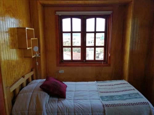 A bed or beds in a room at CABAÑAS REY-MAR