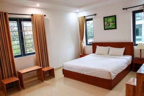 Ein Bett oder Betten in einem Zimmer der Unterkunft Hoi An Town Of Viet House Homestay