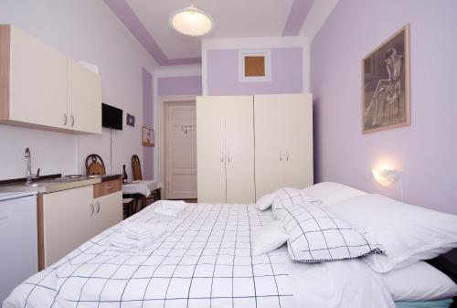 Posteľ alebo postele v izbe v ubytovaní Studio apartman Bulesic