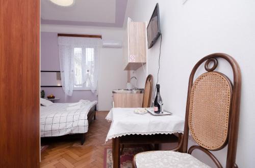 Posteľ alebo postele v izbe v ubytovaní Studio apartman Bulesic