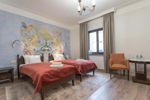 Ένα ή περισσότερα κρεβάτια σε δωμάτιο στο Hotel Ester