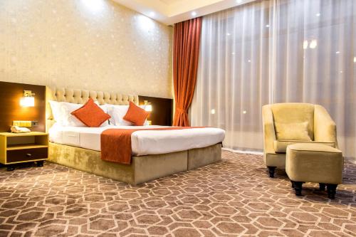Megapolis Hotel Shymkentにあるベッド