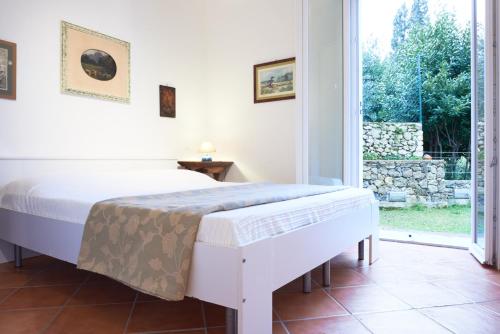 Postelja oz. postelje v sobi nastanitve Casetta Gialla