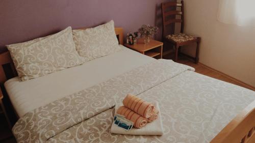 מיטה או מיטות בחדר ב-Hotel Konaciste Goc Trstenik