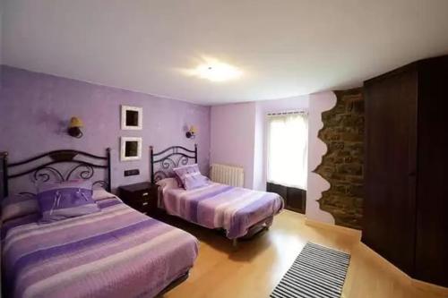 Postel nebo postele na pokoji v ubytování CASA TENA