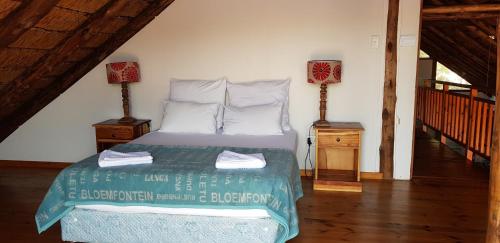 Ένα ή περισσότερα κρεβάτια σε δωμάτιο στο Pirates Creek Self-Catering Chalets