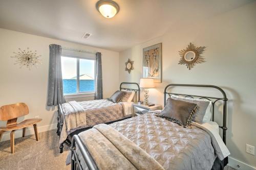 a bedroom with two beds and a window at Quiet Home by Dtwn Livingston Hike, Fish and Ski! in Livingston