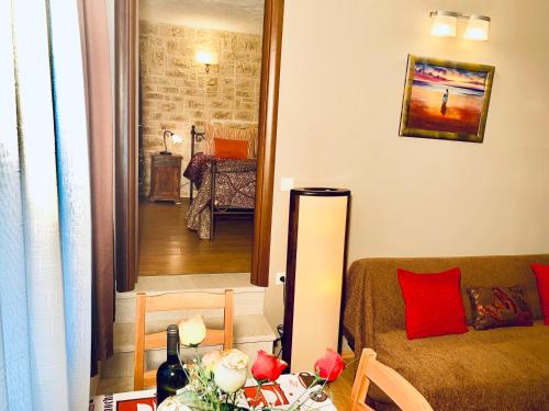 Гостиная зона в Ermones Odyssesas Bungalow