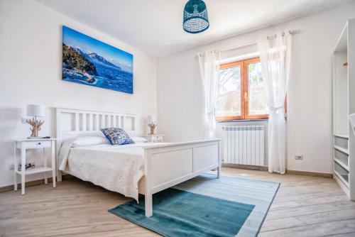 Postel nebo postele na pokoji v ubytování Albero di Giada