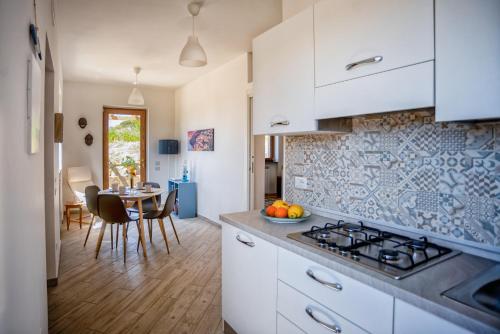 Kuchyň nebo kuchyňský kout v ubytování Albero di Giada