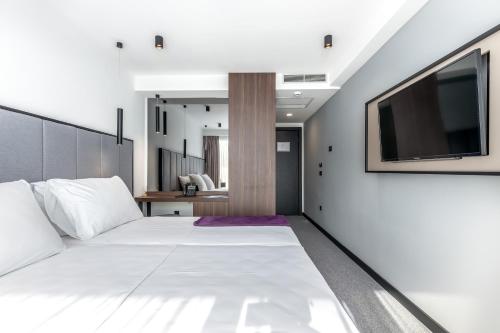 Ένα ή περισσότερα κρεβάτια σε δωμάτιο στο Hotel Ad Turres