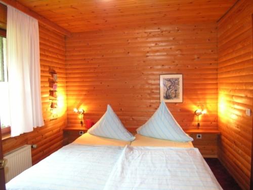 Postel nebo postele na pokoji v ubytování Haus 2 - Typ A (Appartement)