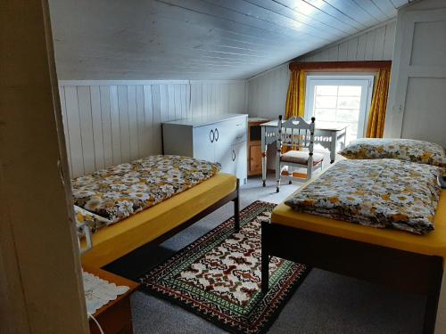 Postel nebo postele na pokoji v ubytování Casa Schuoler